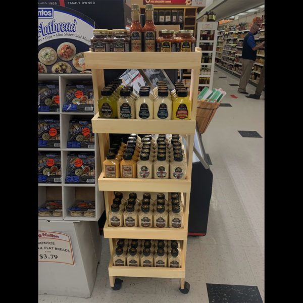 4Post Wood Display Rack in a Grocery Store InterMarket Technology