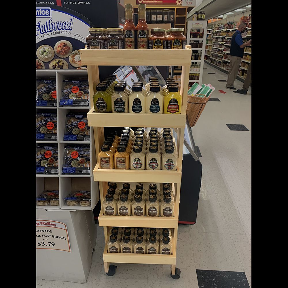 4-Post Wood Display Rack in a Grocery Store